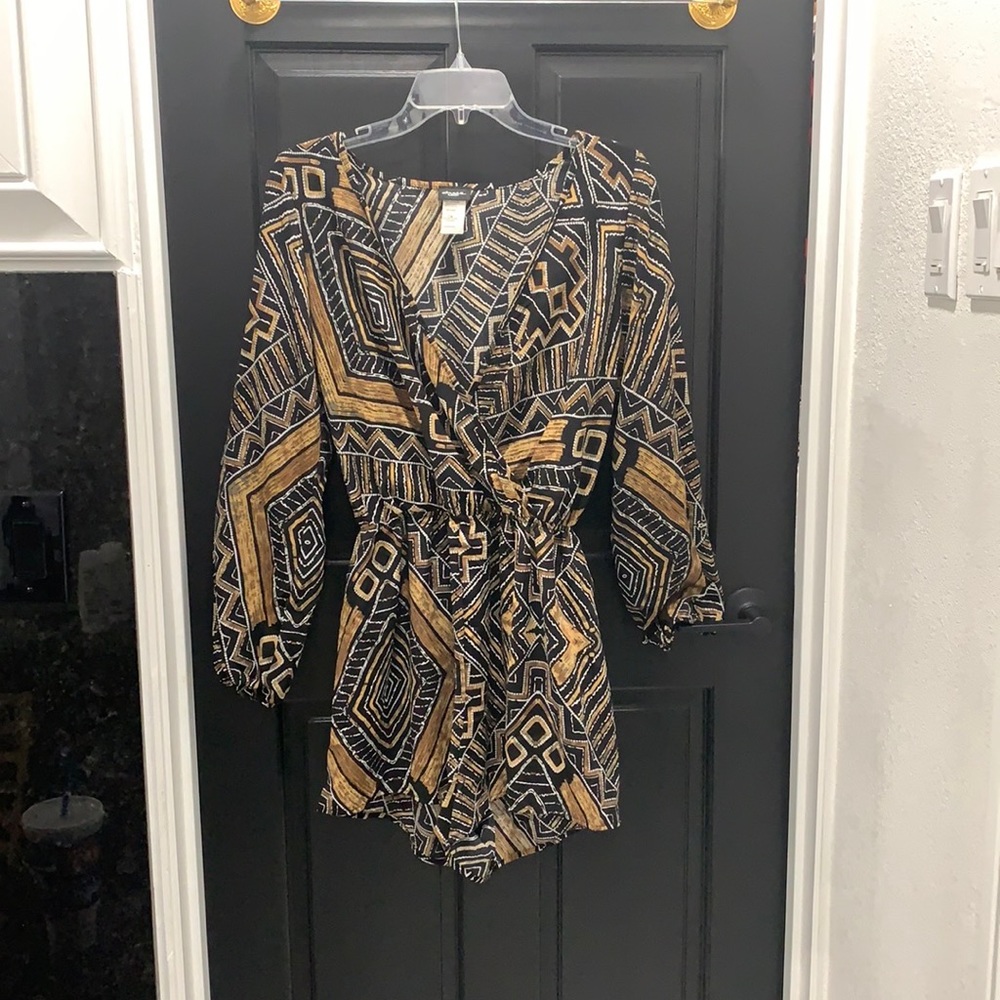 Boutique, long sleeve, low cut , romper